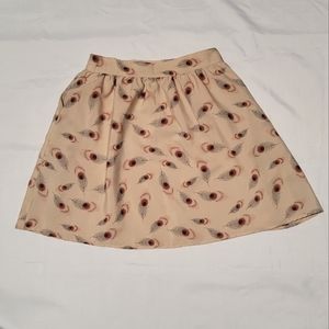 Forever 21 boutique skater skirt with feathers.